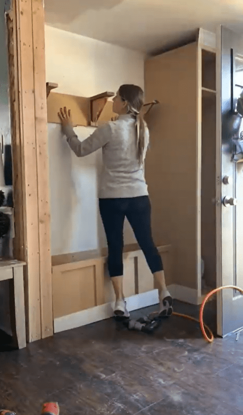Woman building a storage bench