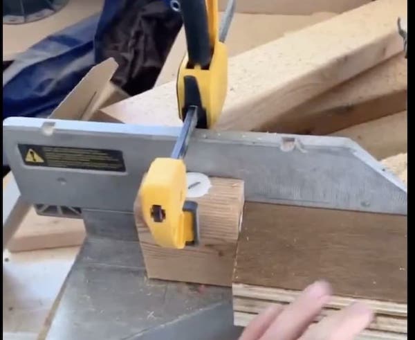 miter saw cutting wood