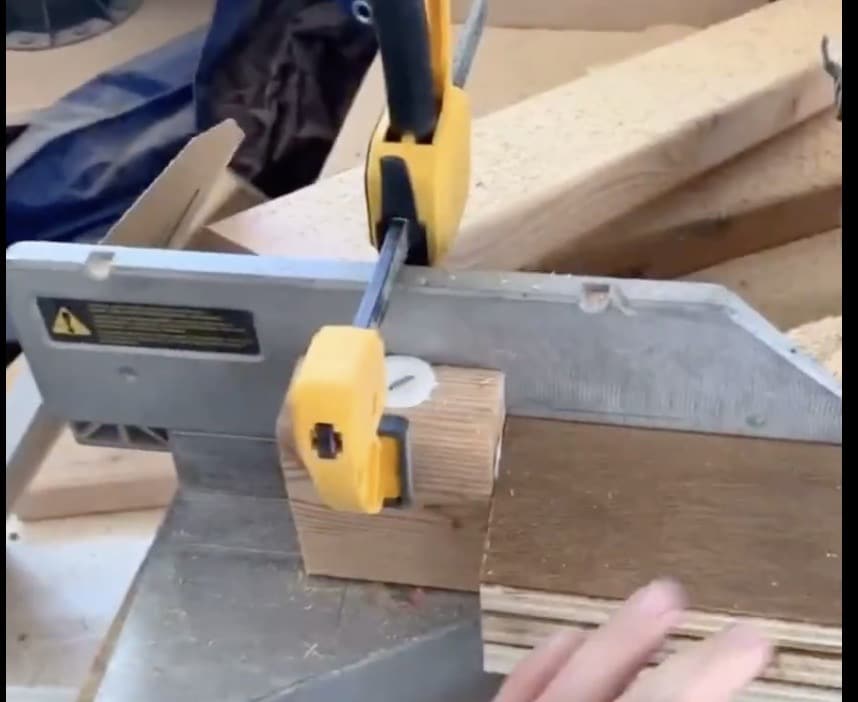 miter saw cutting wood
