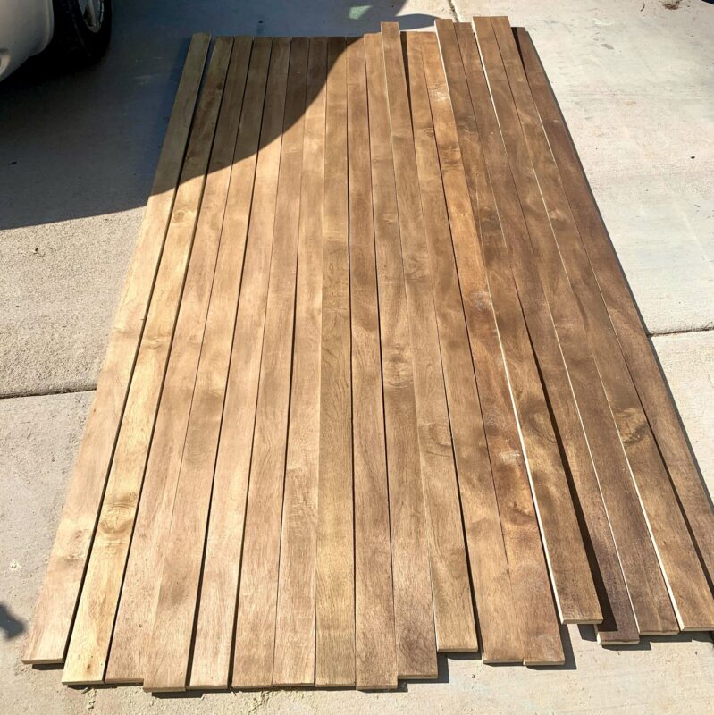 wood laid in a row that are stained