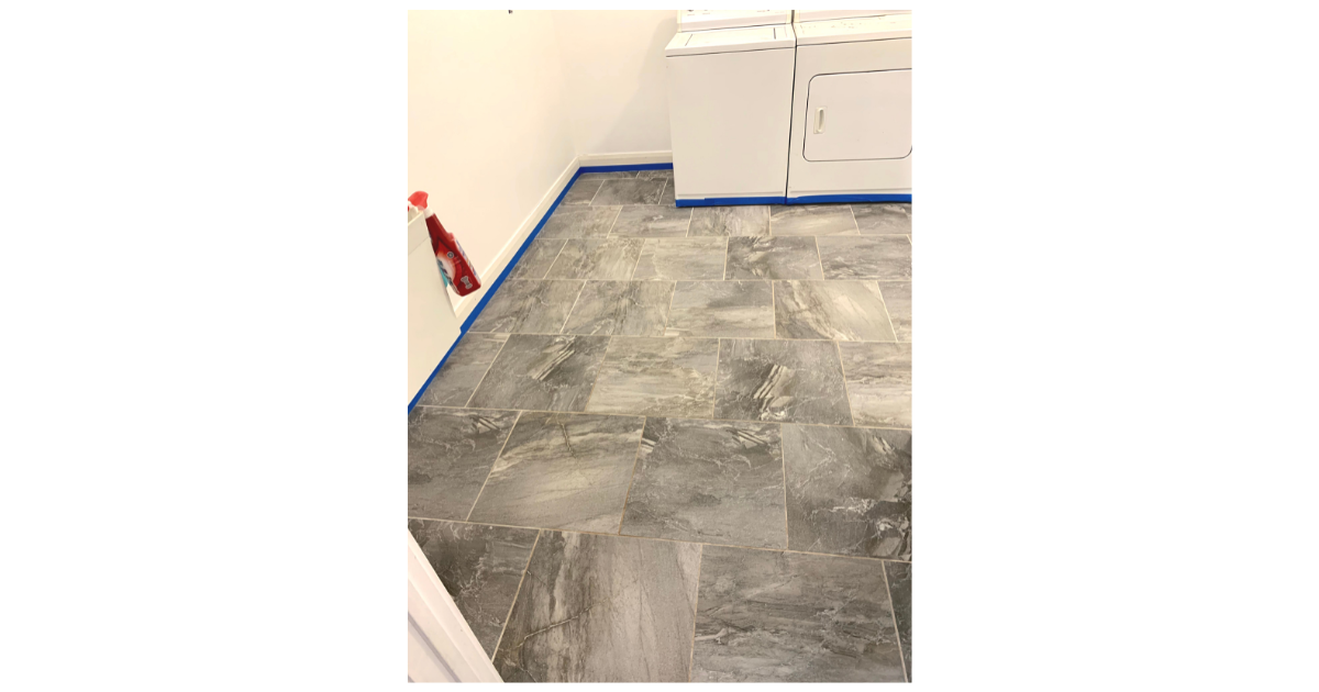 Grey tile floor in laundry room