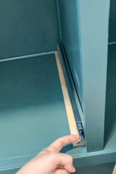 drawer slide set flush with the front of the cabinet opening