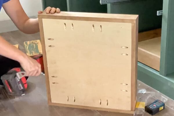 screwing pocket screws through the underside of a DIY drawer box