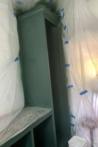 tall pantry cabinet sprayed Caldwell Green by Benjamin Moore
