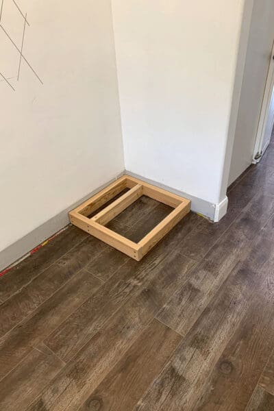 small 2x4 base for the tall butler's pantry cabinet in the corner of the room