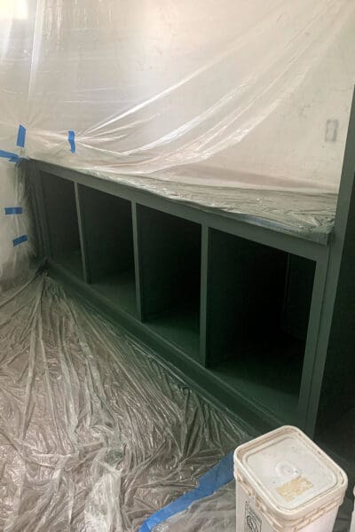 cubby base cabinet sprayed Caldwell Green inside a plastic paint tent