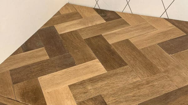   stained herringbone countertop boards and front edge trim checked for color before the epoxy