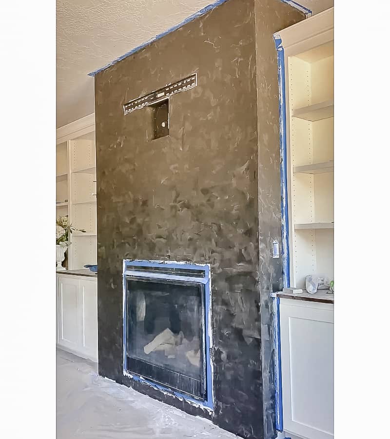 first coat on a black roman clay fireplace