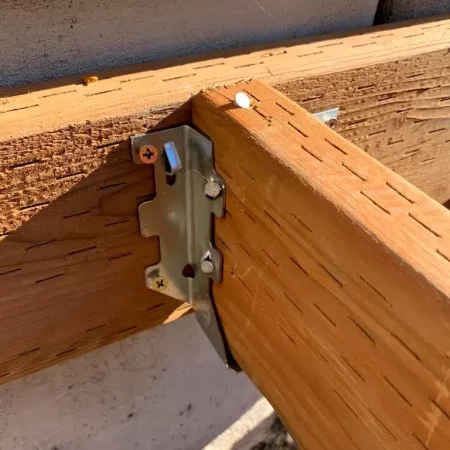 joist holder for wooden deck