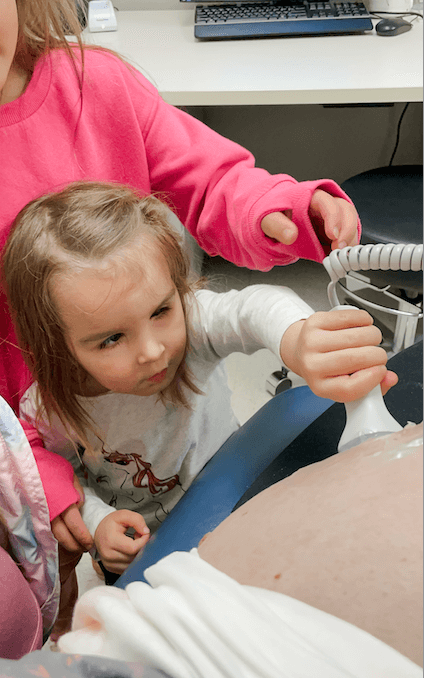 little girl helping with ultrasound