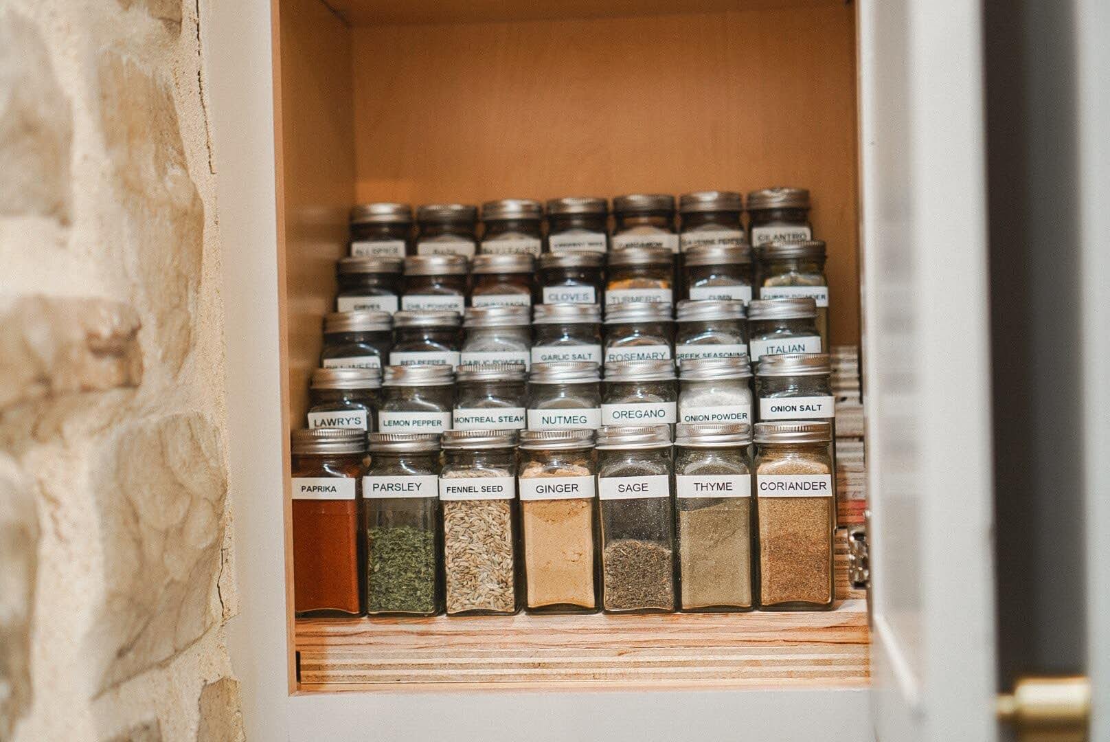 Complete DIY tiered spice rack in kitchen cabinet