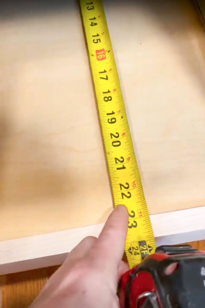 measuring distance between front lip of cabinet to the back of cabinet