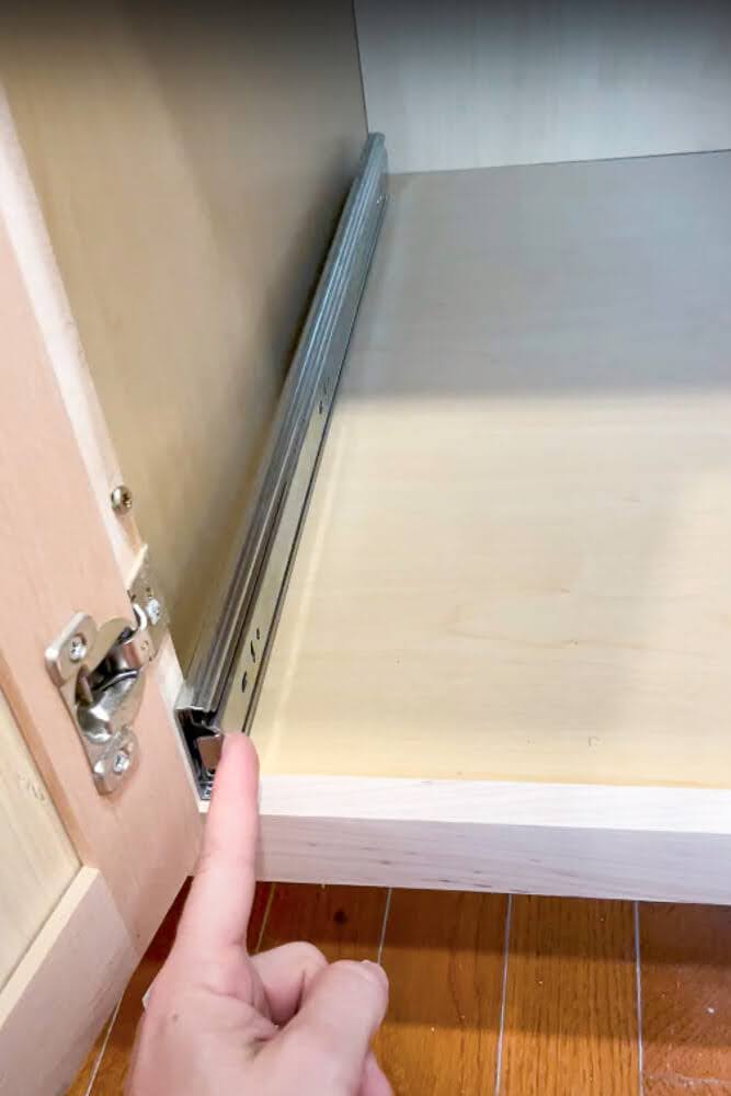 Drawer slide flush with cabinet face frame in sliding trash drawer project