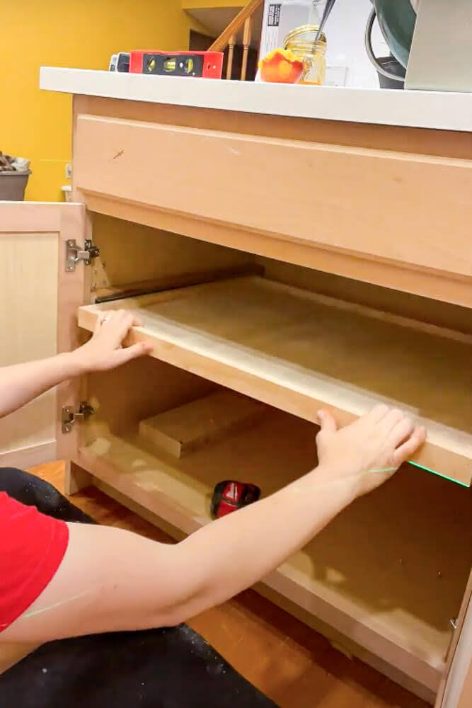 placing drawer and slides into place