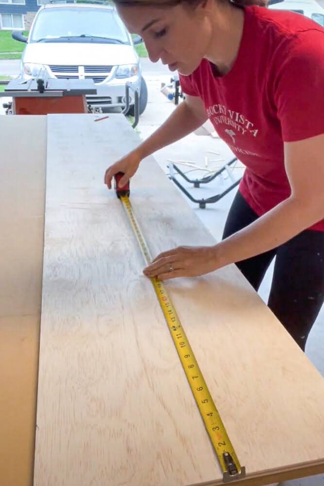 Measuring down the middle of board to make a cut