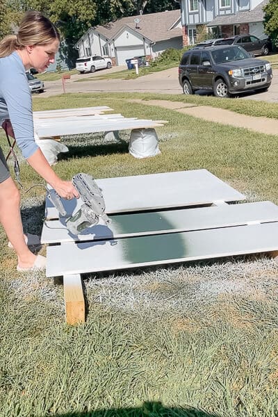 Spraying Montenegro Green paint 