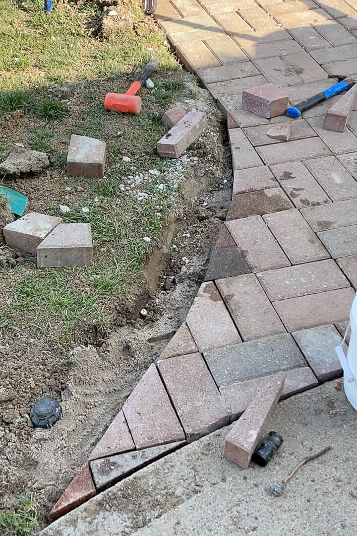 Curved portion of a paver driveway.