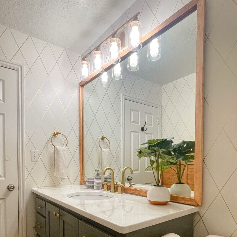 Easy DIY Bathroom Mirror Frame - Crystel Montenegro Home