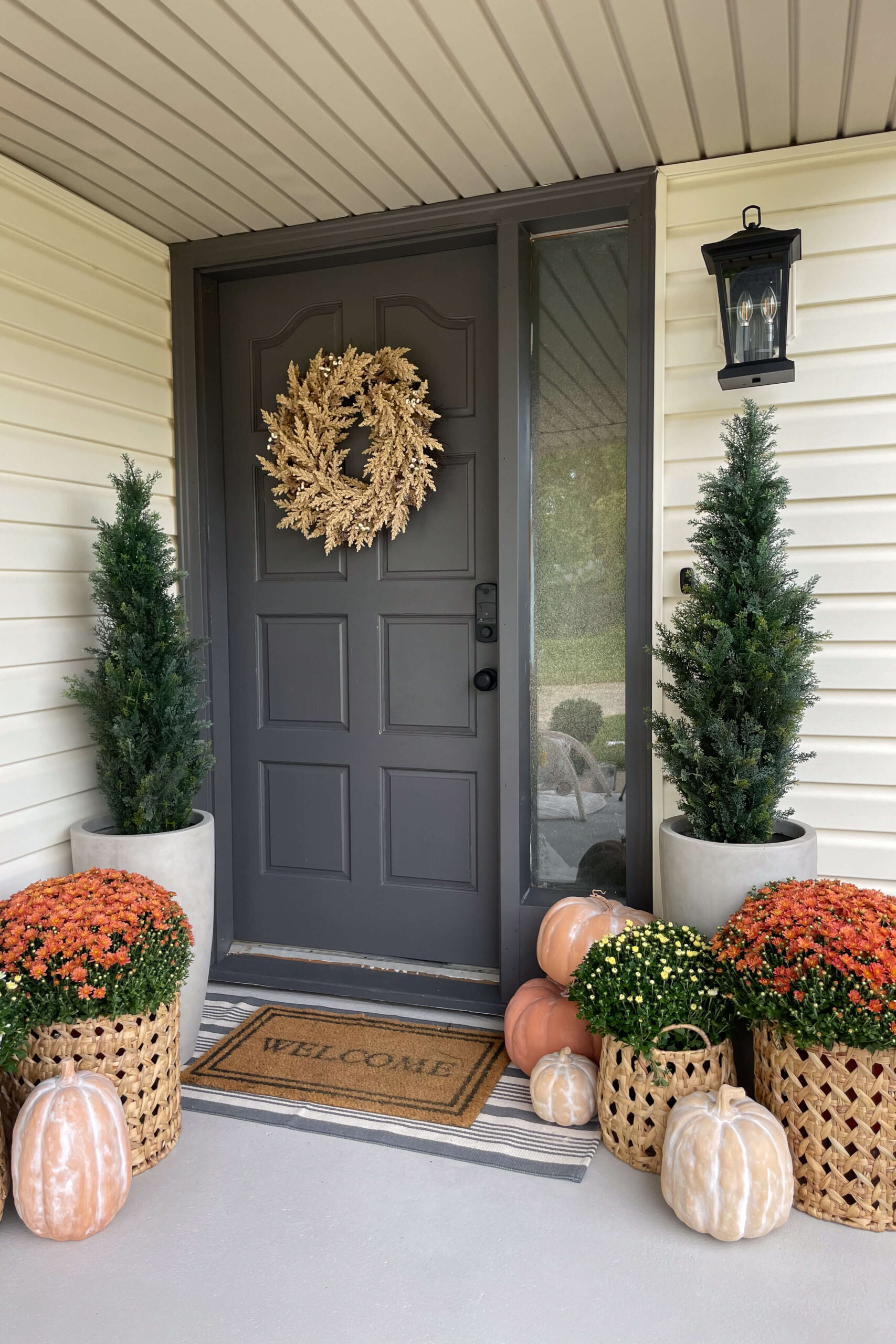 Decorating a small porch for fall.