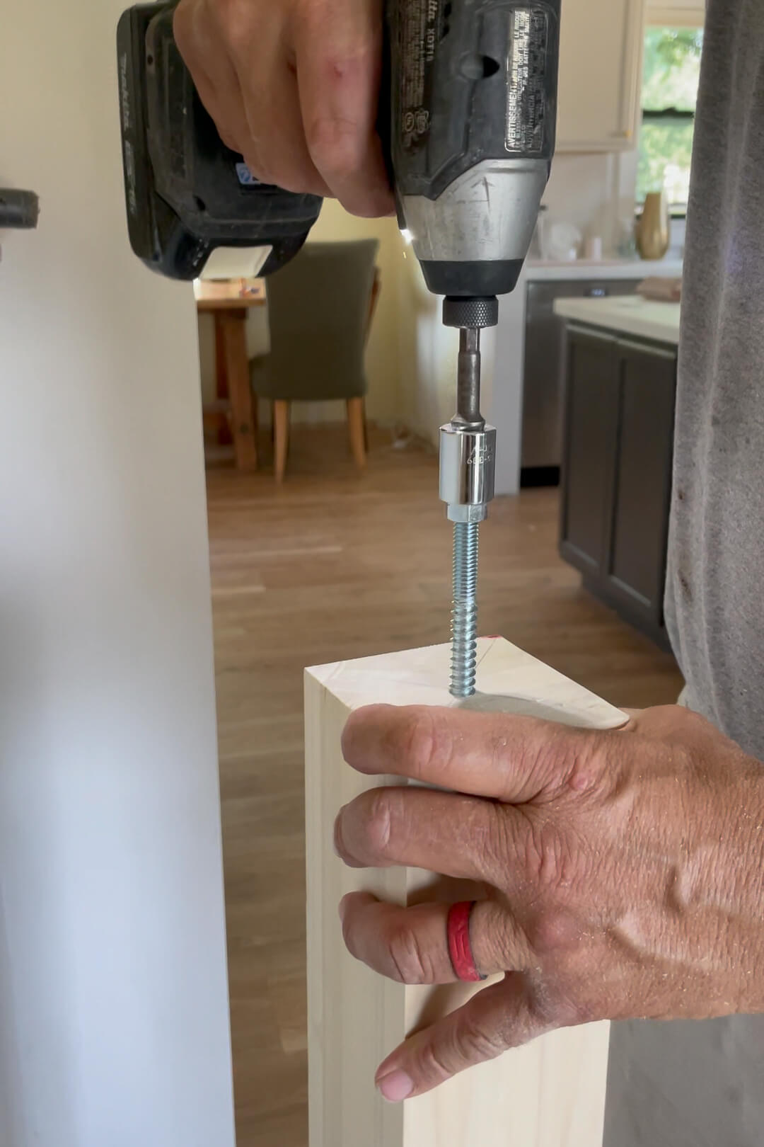 Using hardware from LJ-3004 Newel Mounting Kit to install a newel post. 