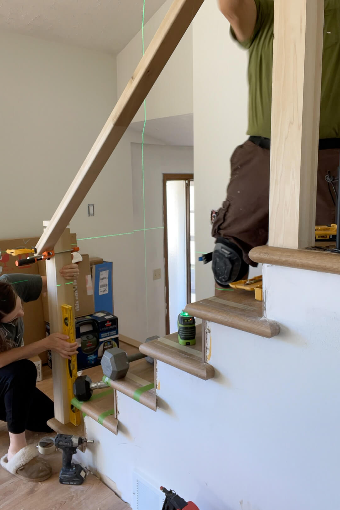 Installing a handrail on a modern style stairs. 