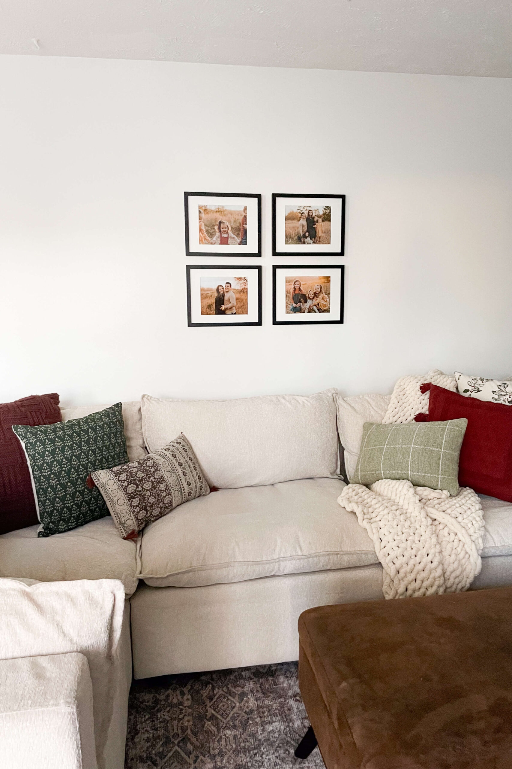 Small gallery wall over a couch.