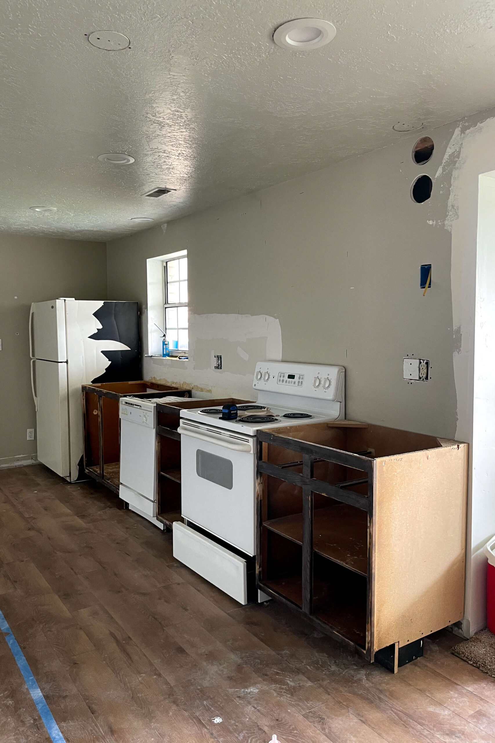 Moving cabinets in a kitchen.