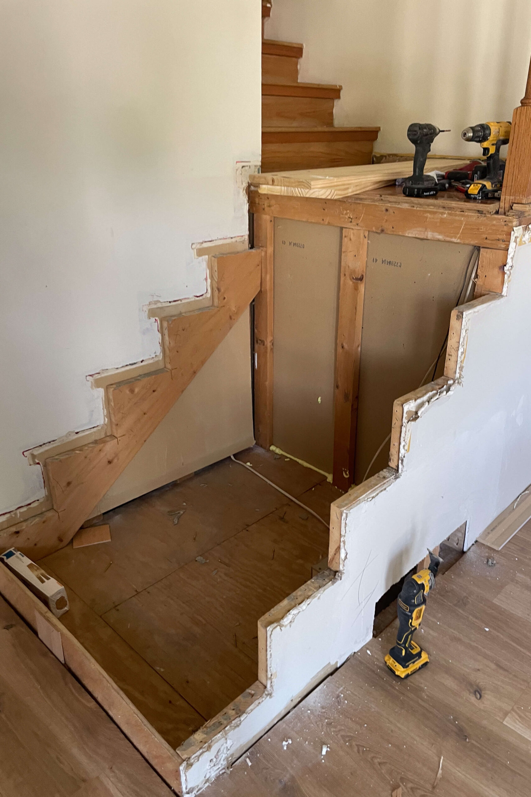 Removing treads and risers off of a staircase.