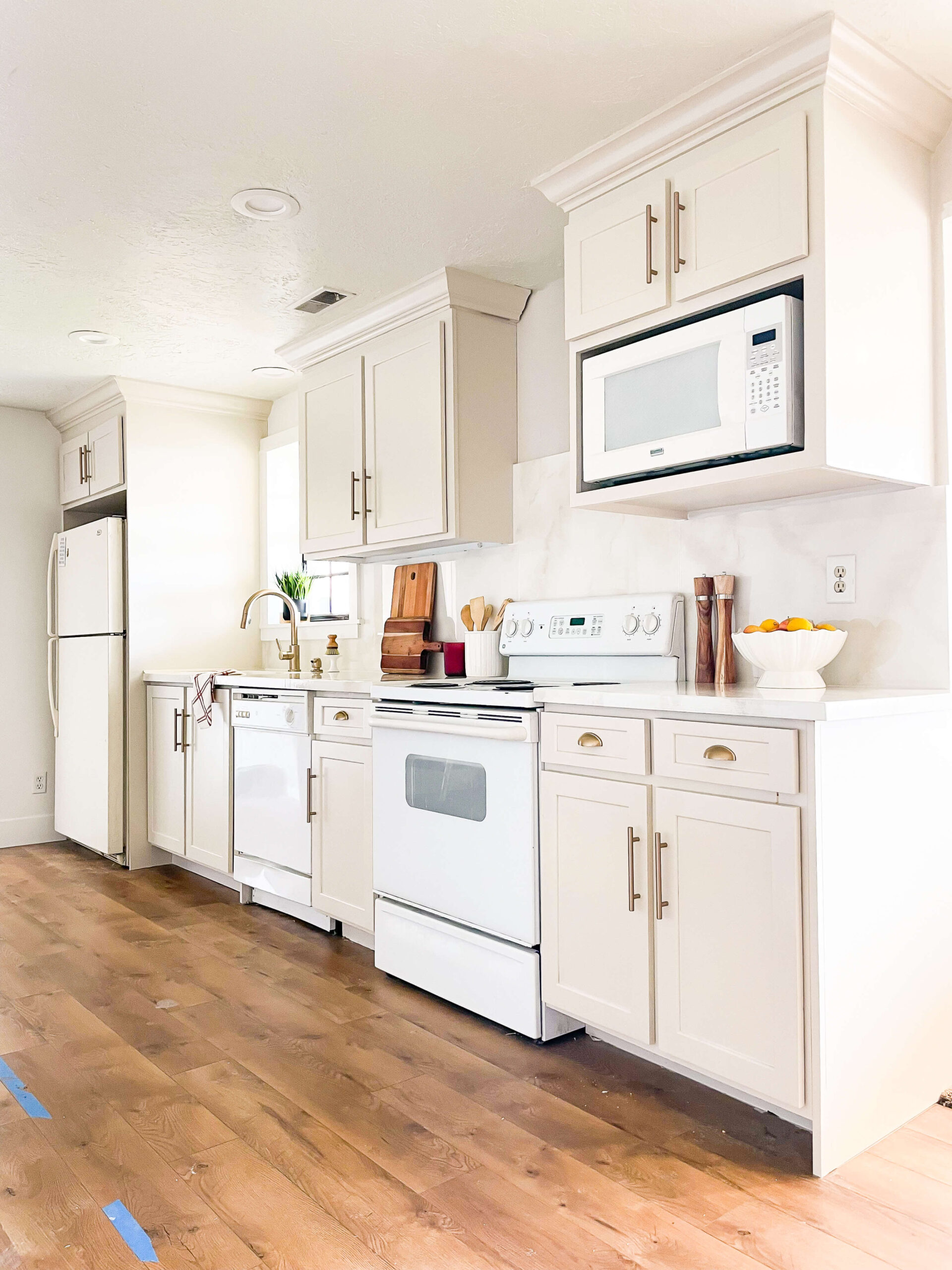 Finished DIY kitchen remodel using refurbished kitchen cabinets.