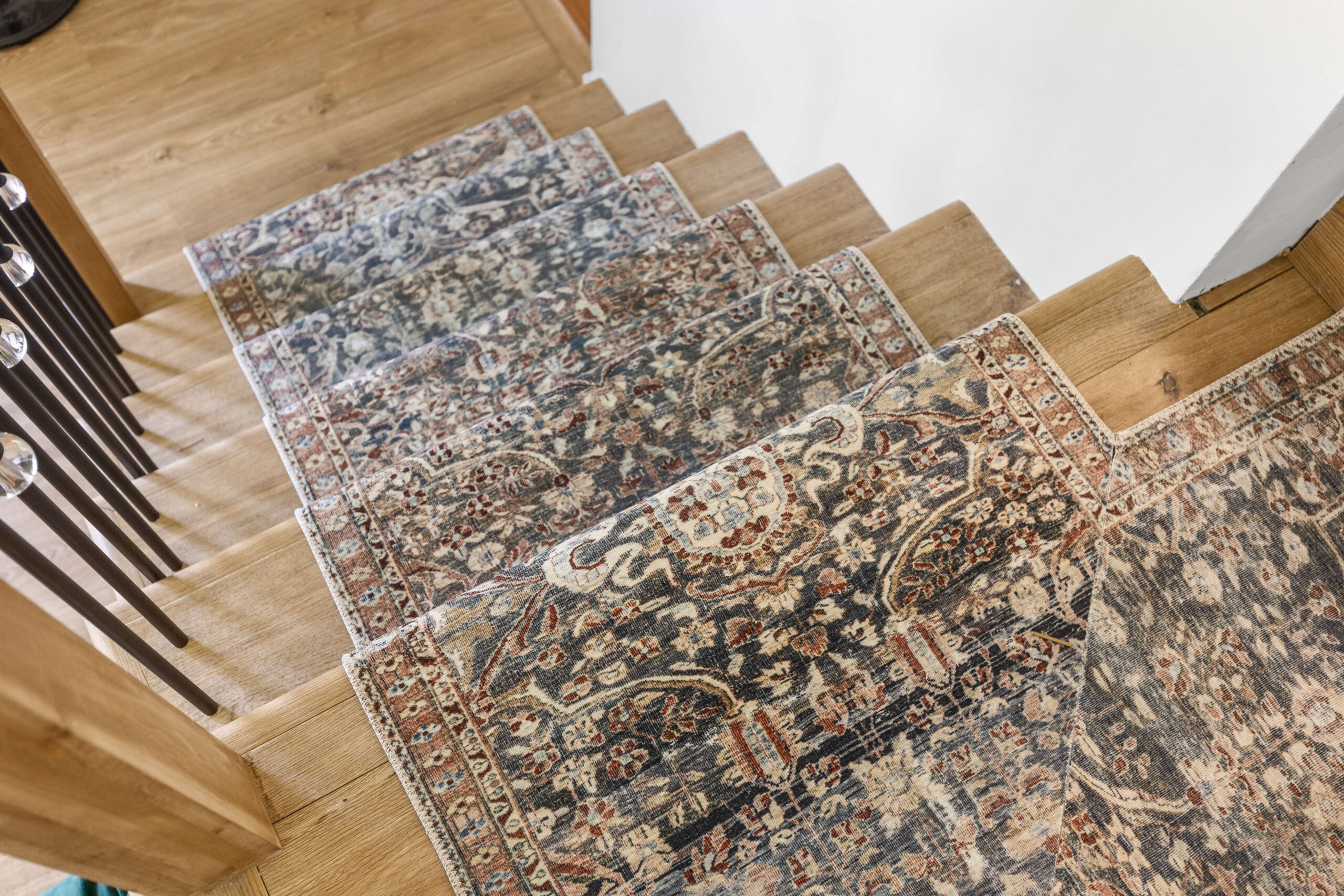 Turning the corner on a landing for a stair runner. 