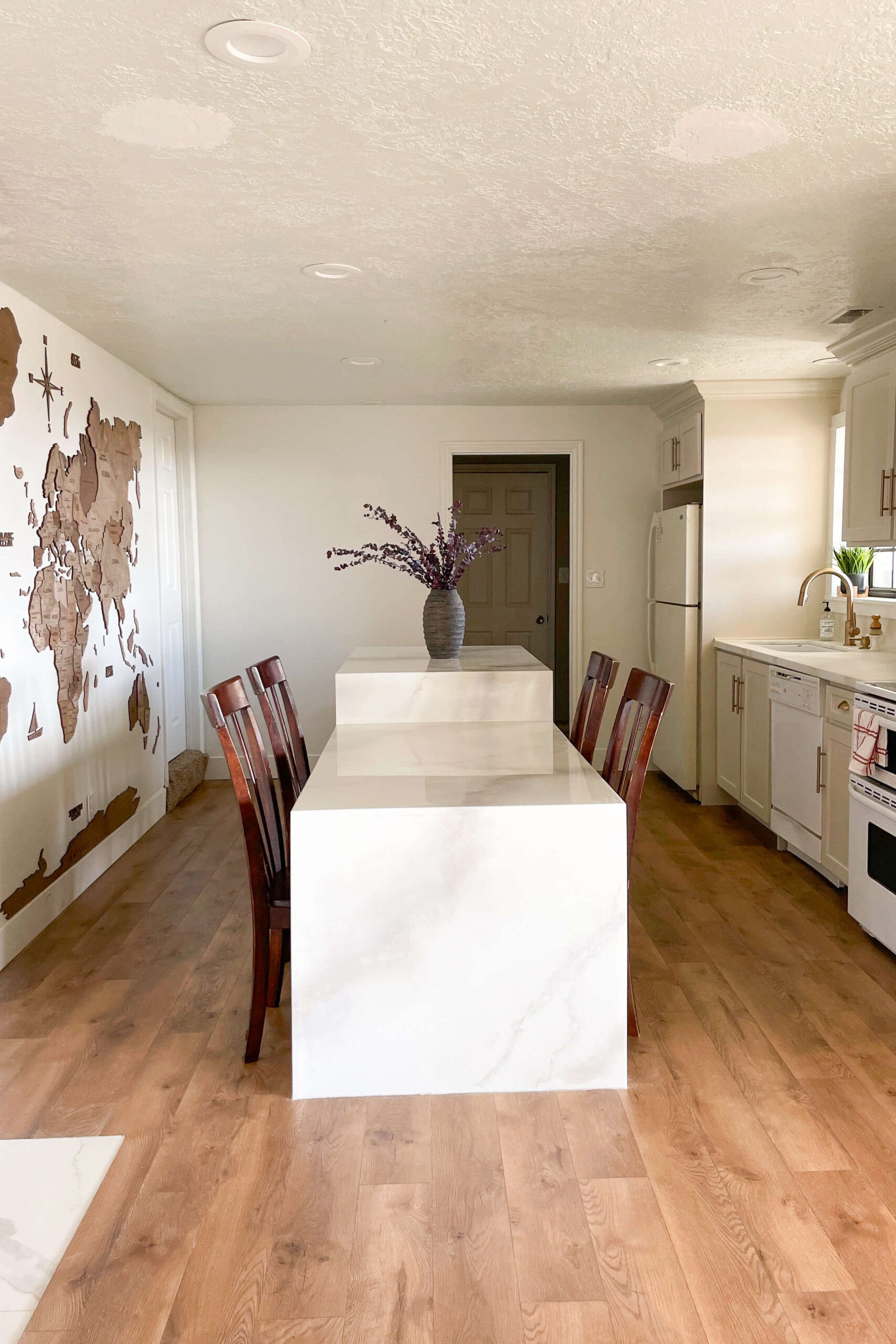 Finished waterfall kitchen island in a DIY kitchen.