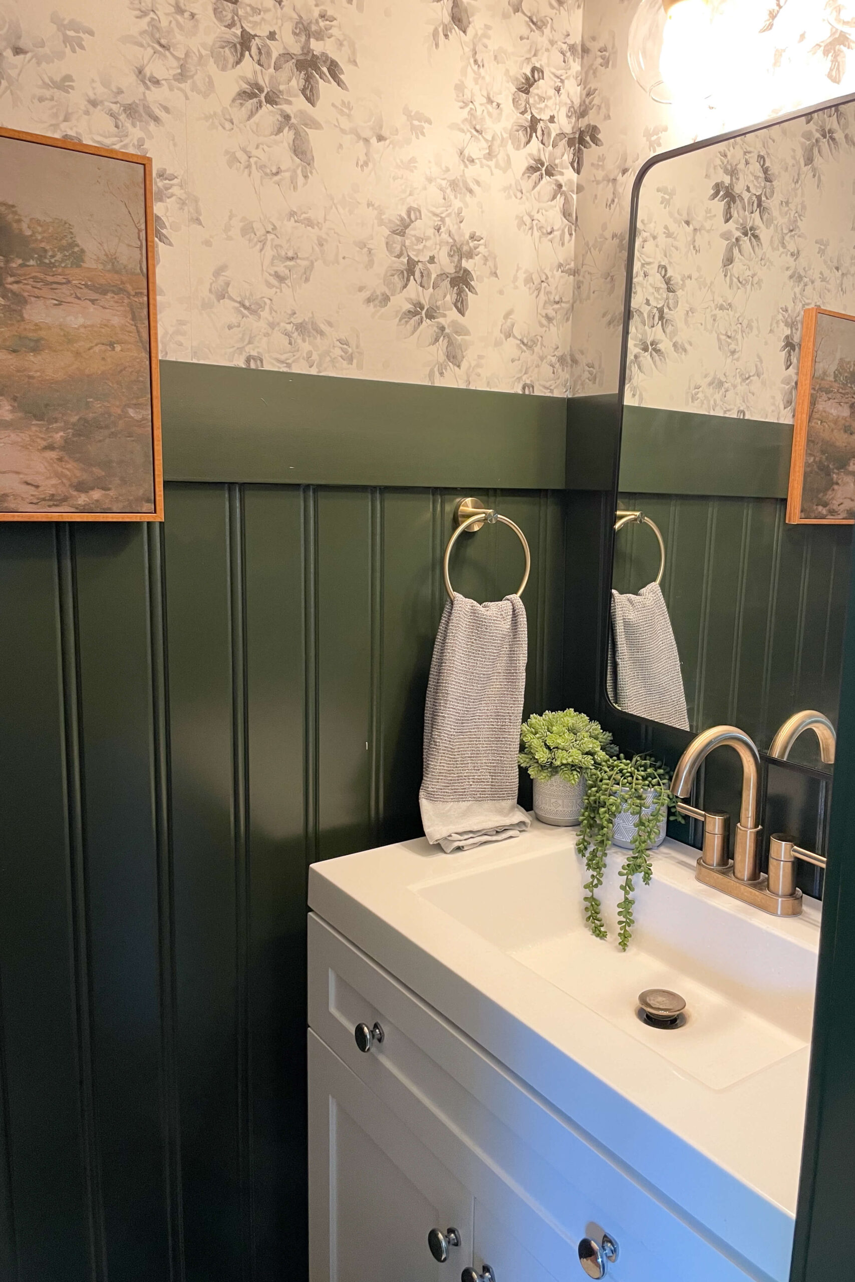 Finished bathroom walls with beadboard.