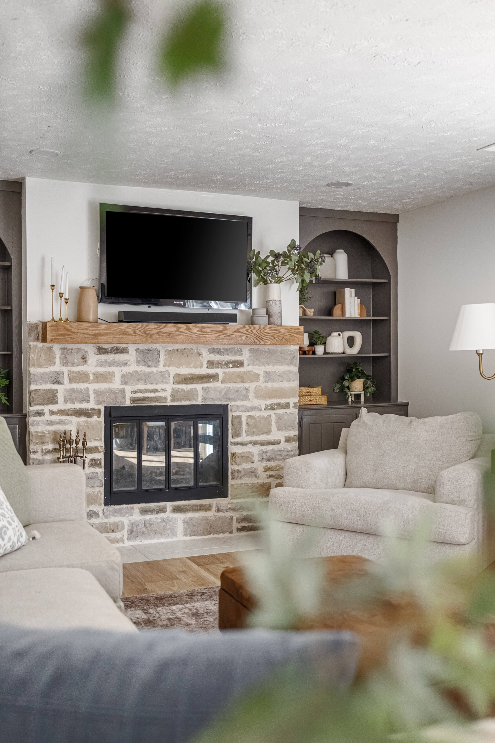 After photo of a rock fireplace that was out of date and ugly.