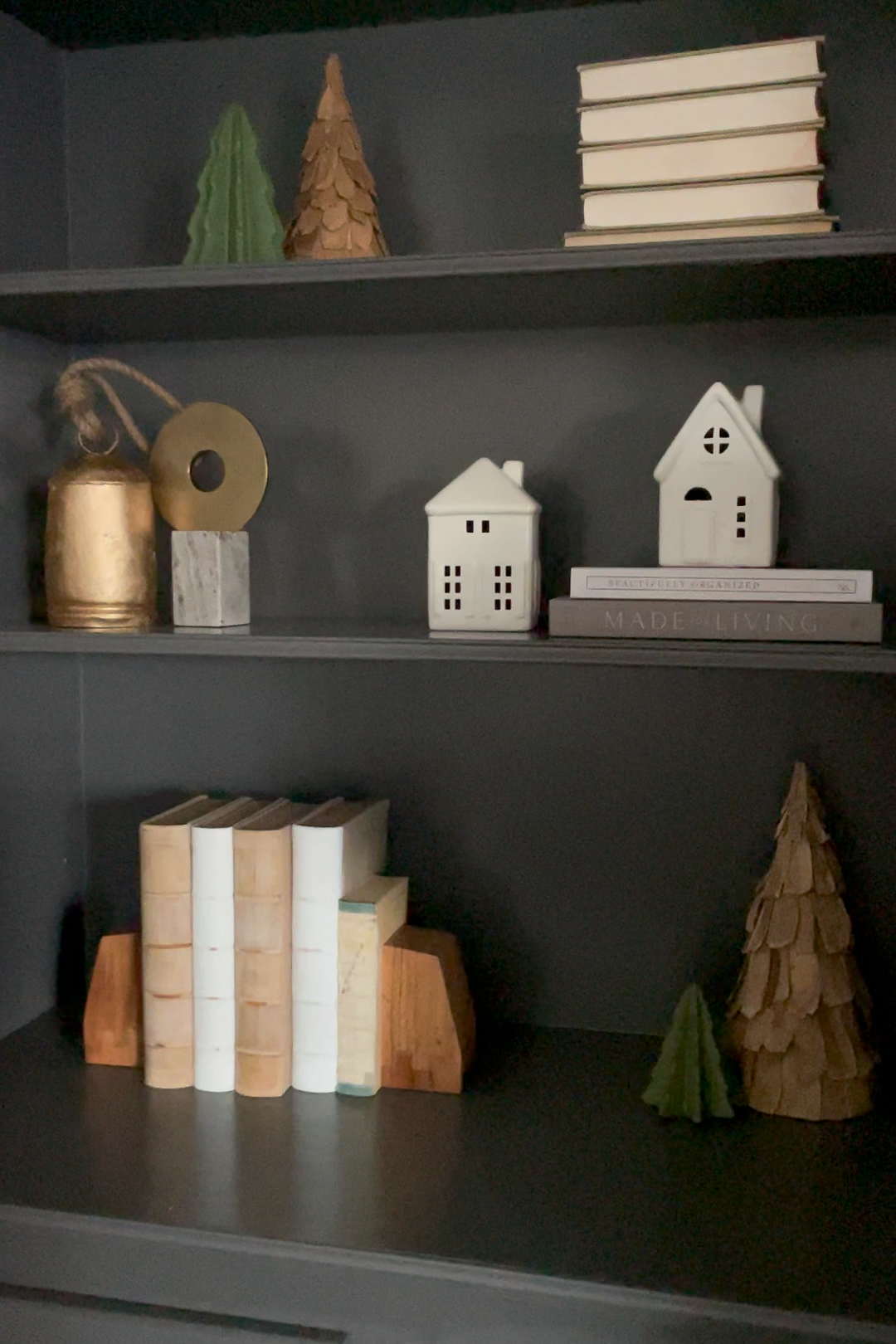 Living room shelves decorated for Christmas.