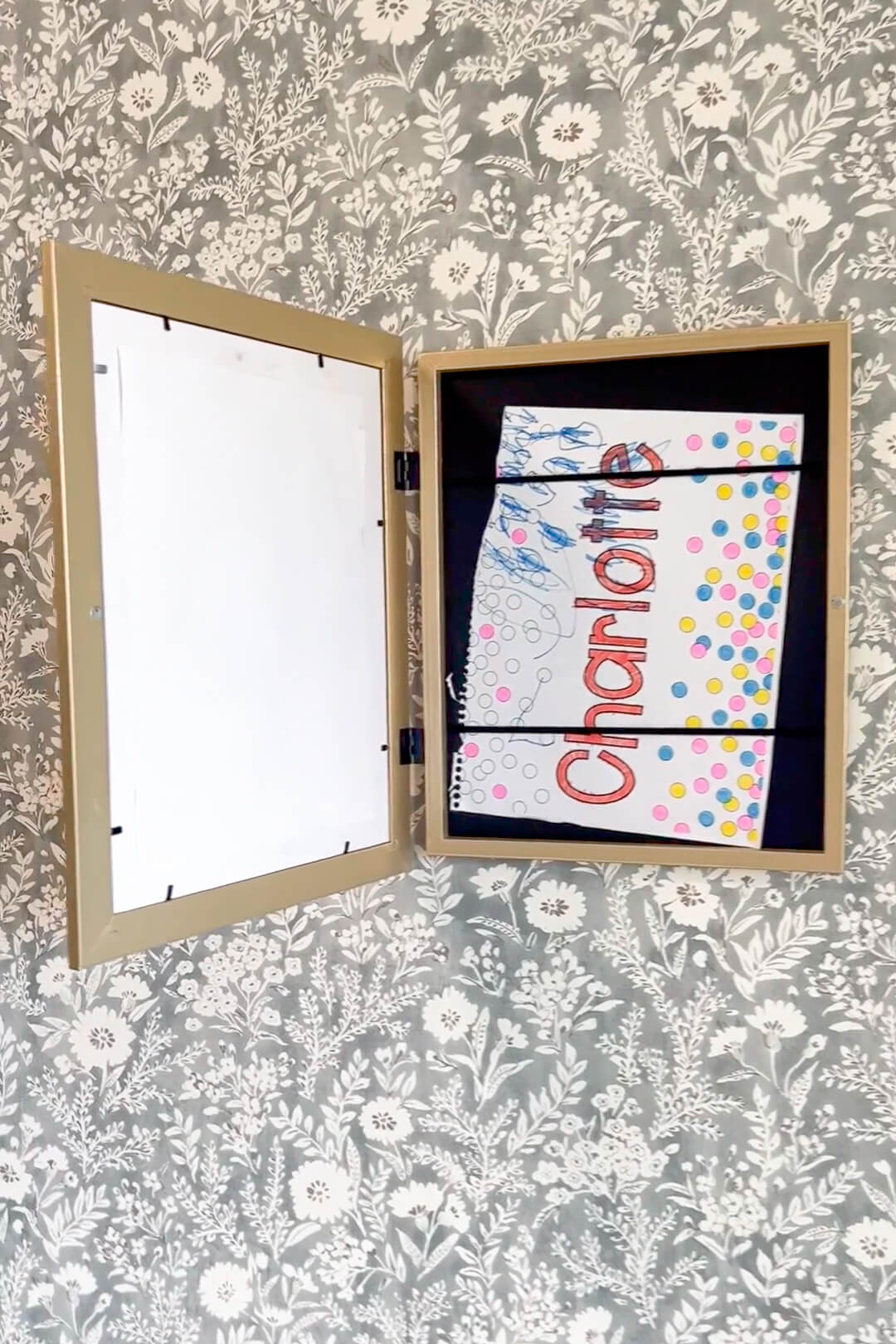 Frame that opens up for displaying kids artwork.