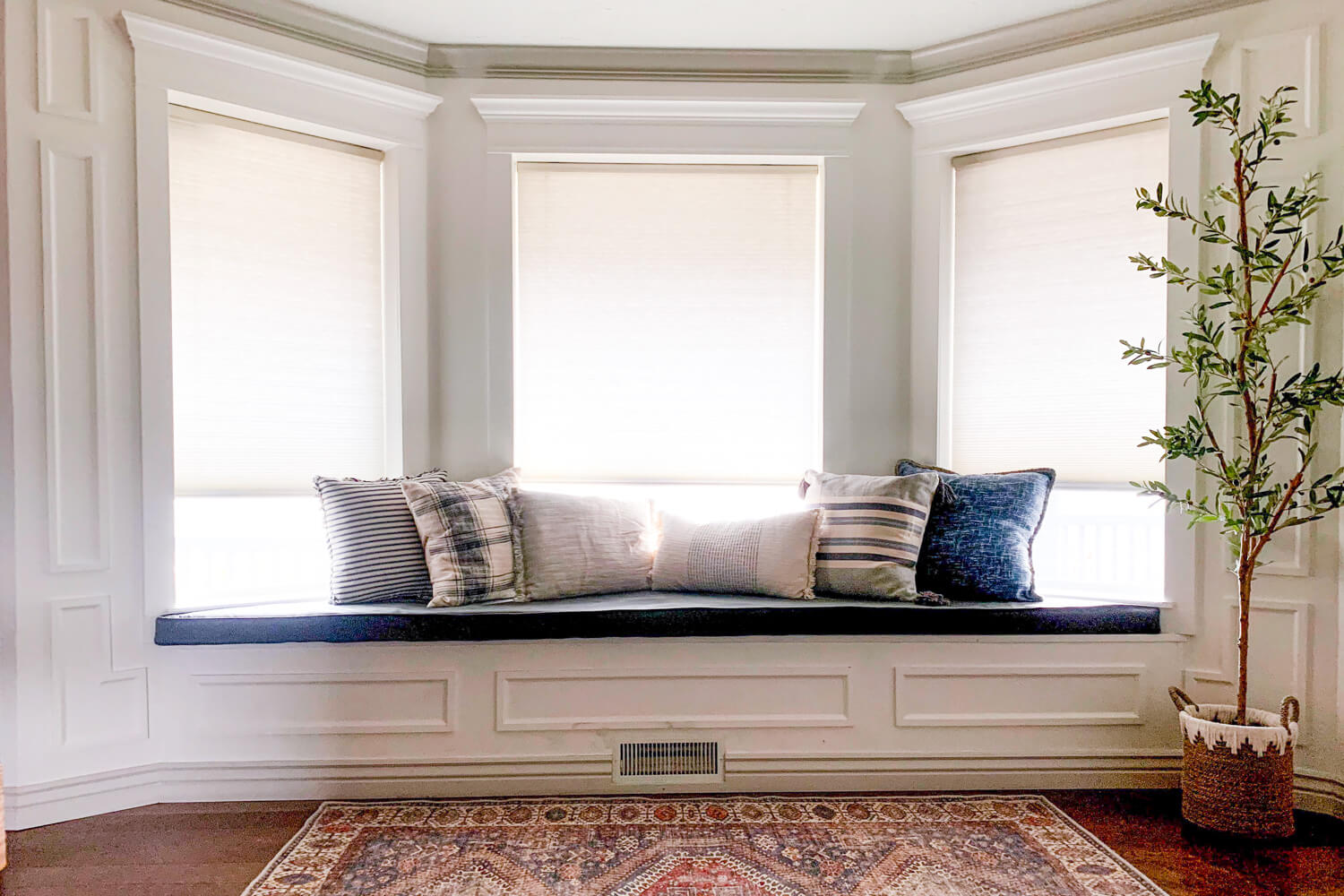 Gorgeous bay window with classic style bay window trim and molding.