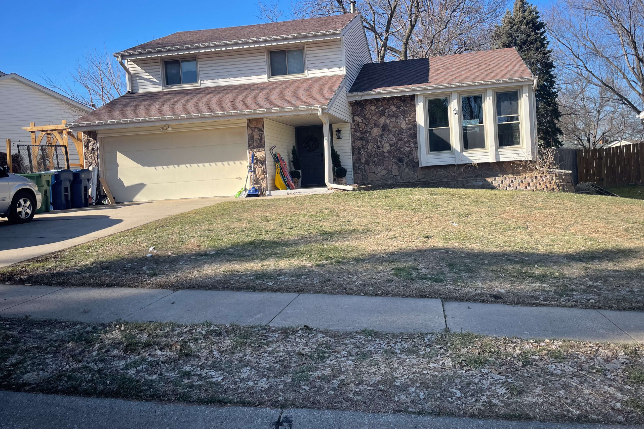 The front of our house before working on any yard designs.