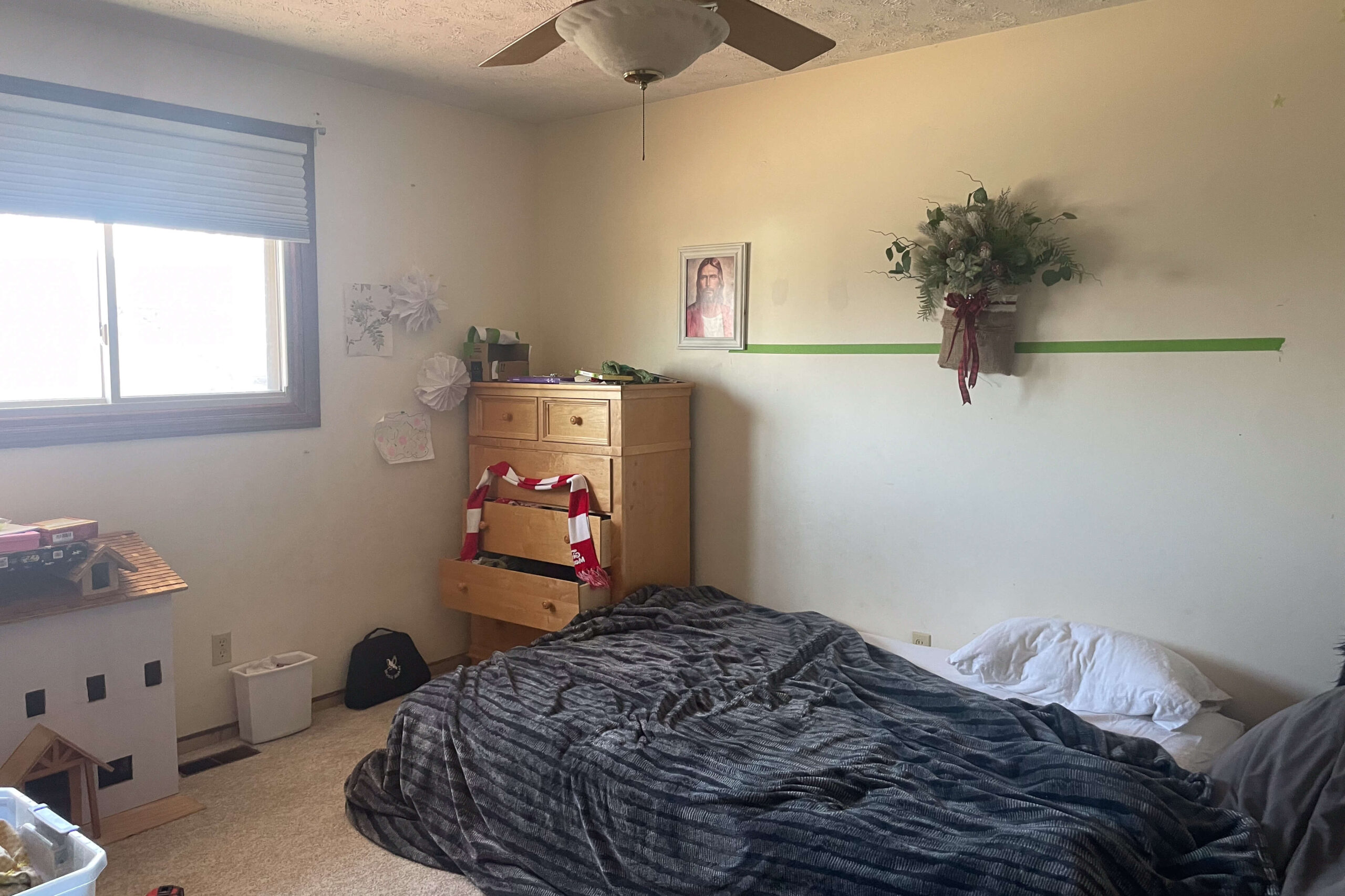 Photo of kids' room before building DIY built-in bunk beds.