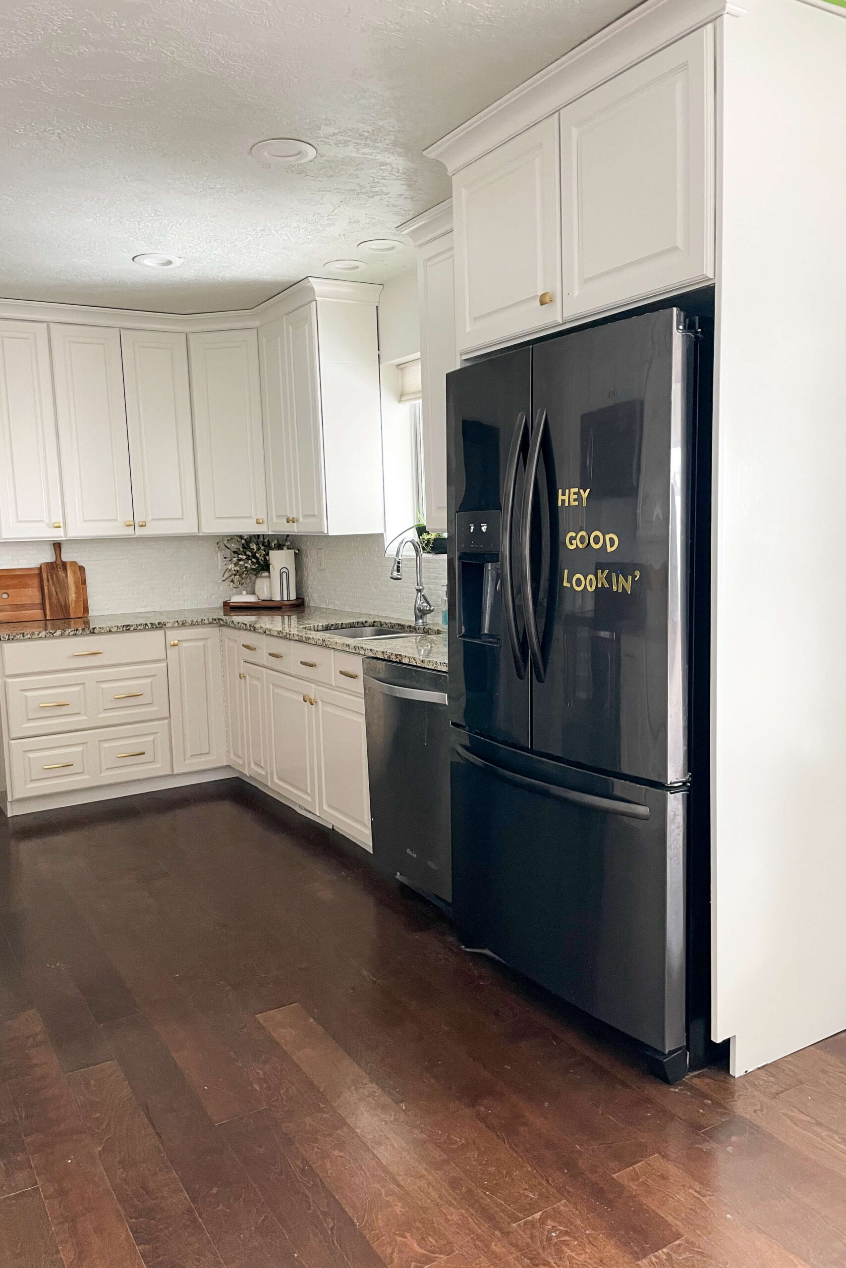 Before and after photos of kitchen cabinet painting.