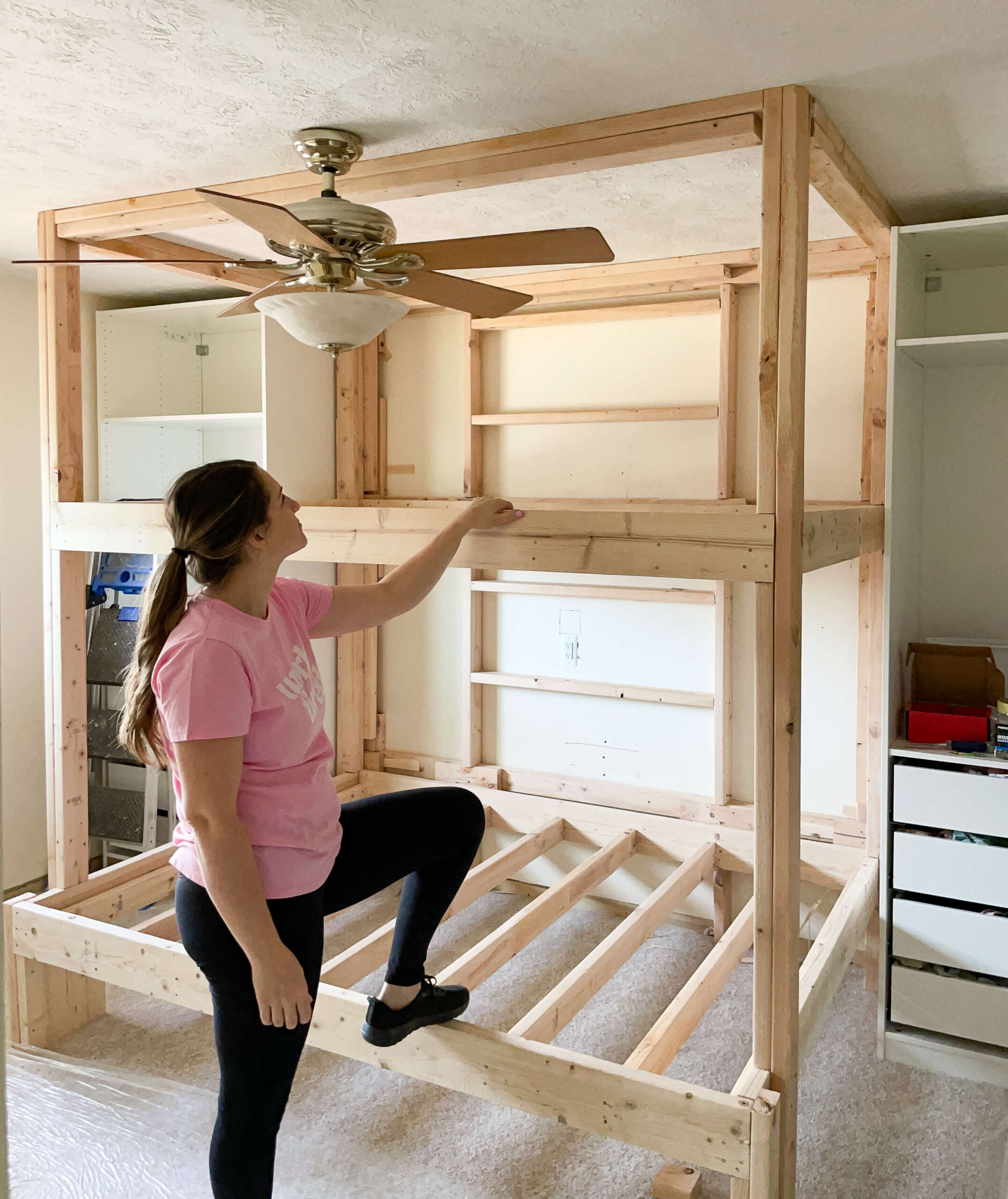 An in-progress photo of me building DIY bunk beds for my girls.