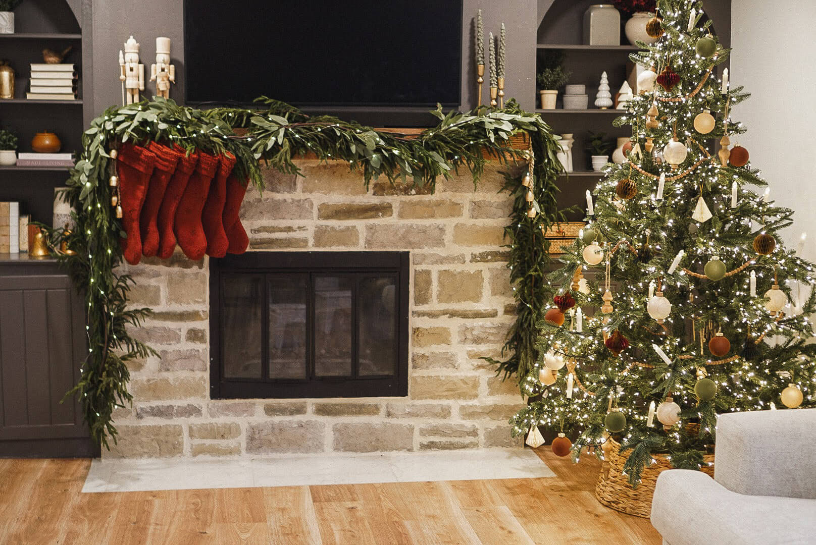 The best fireplace Christmas decor with realistic pine garland.