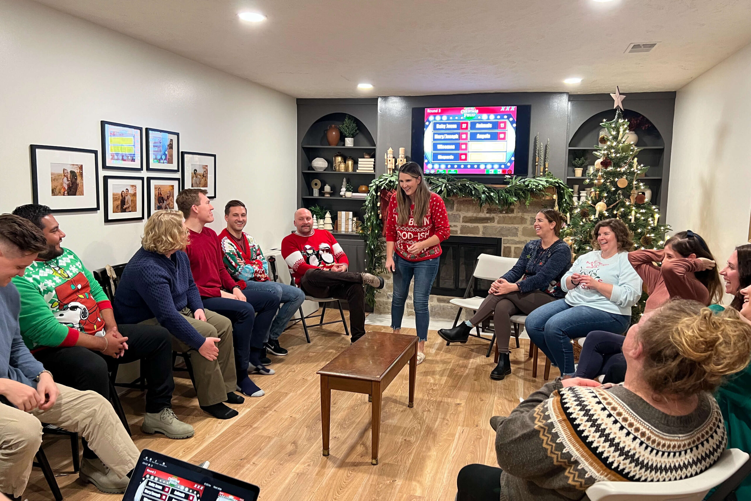 Playing games and having a while elephant gift exchange at a Christmas party.