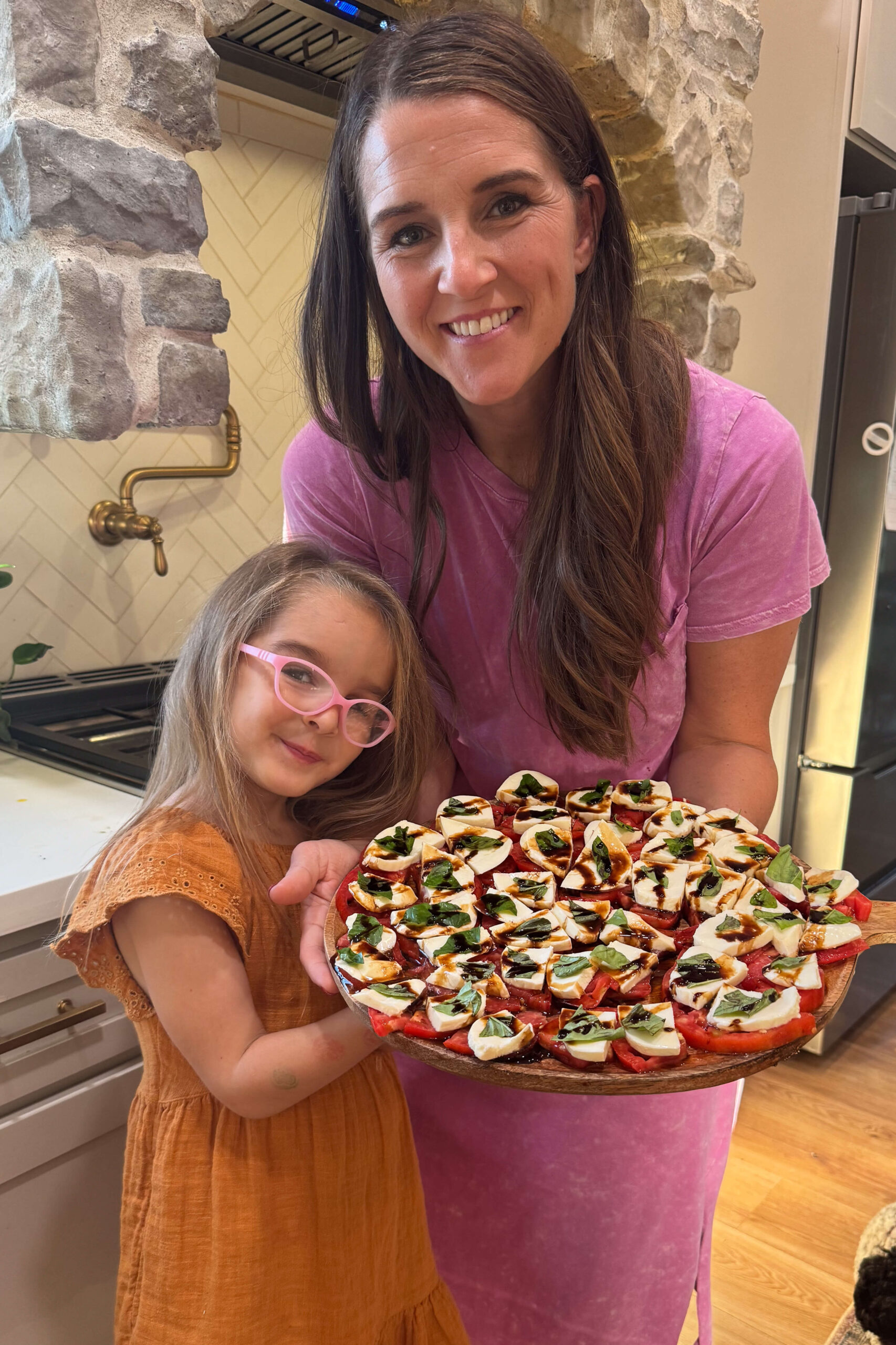 Making caprese salad with your kids.