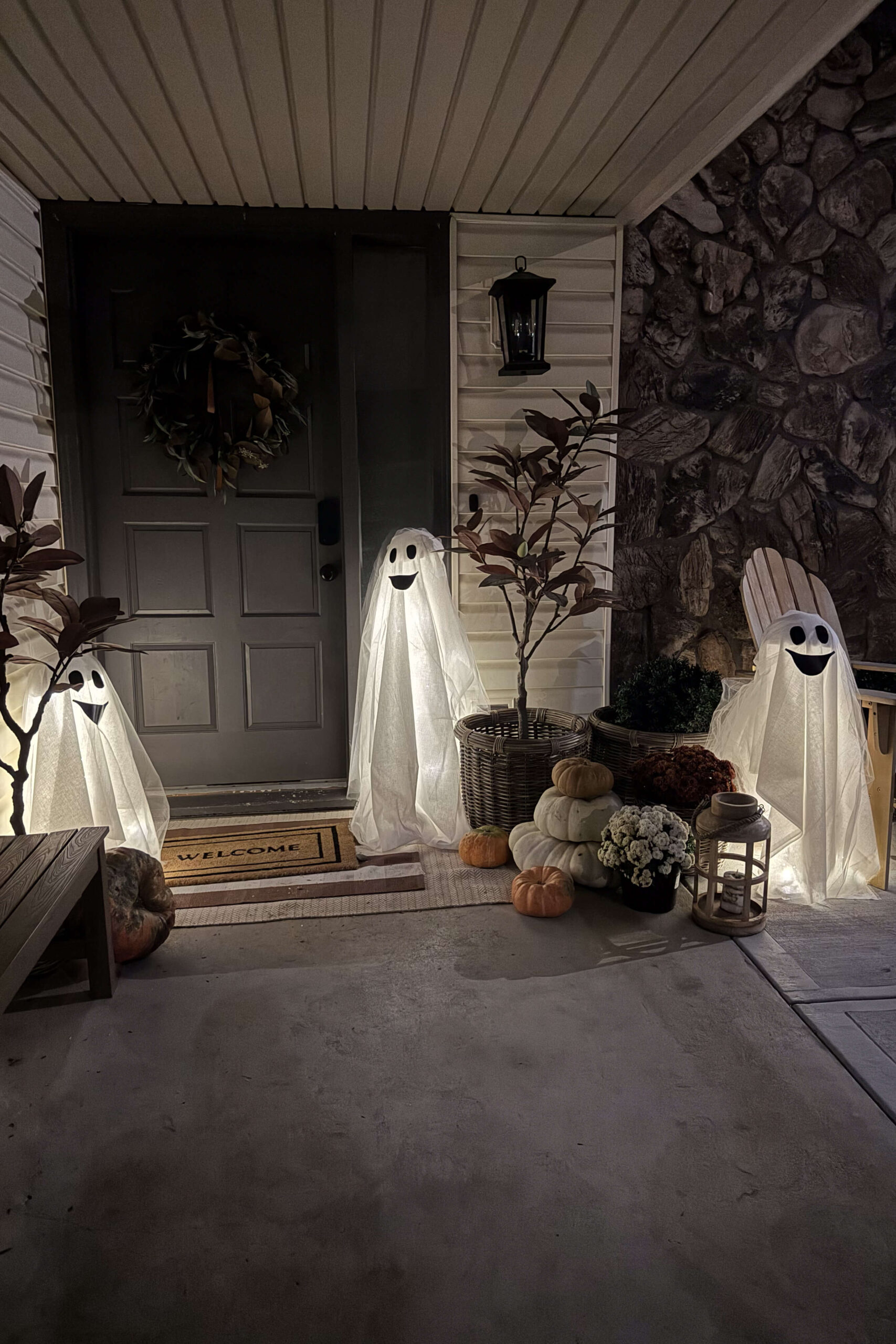 DIY light-up ghosts on my front porch. 