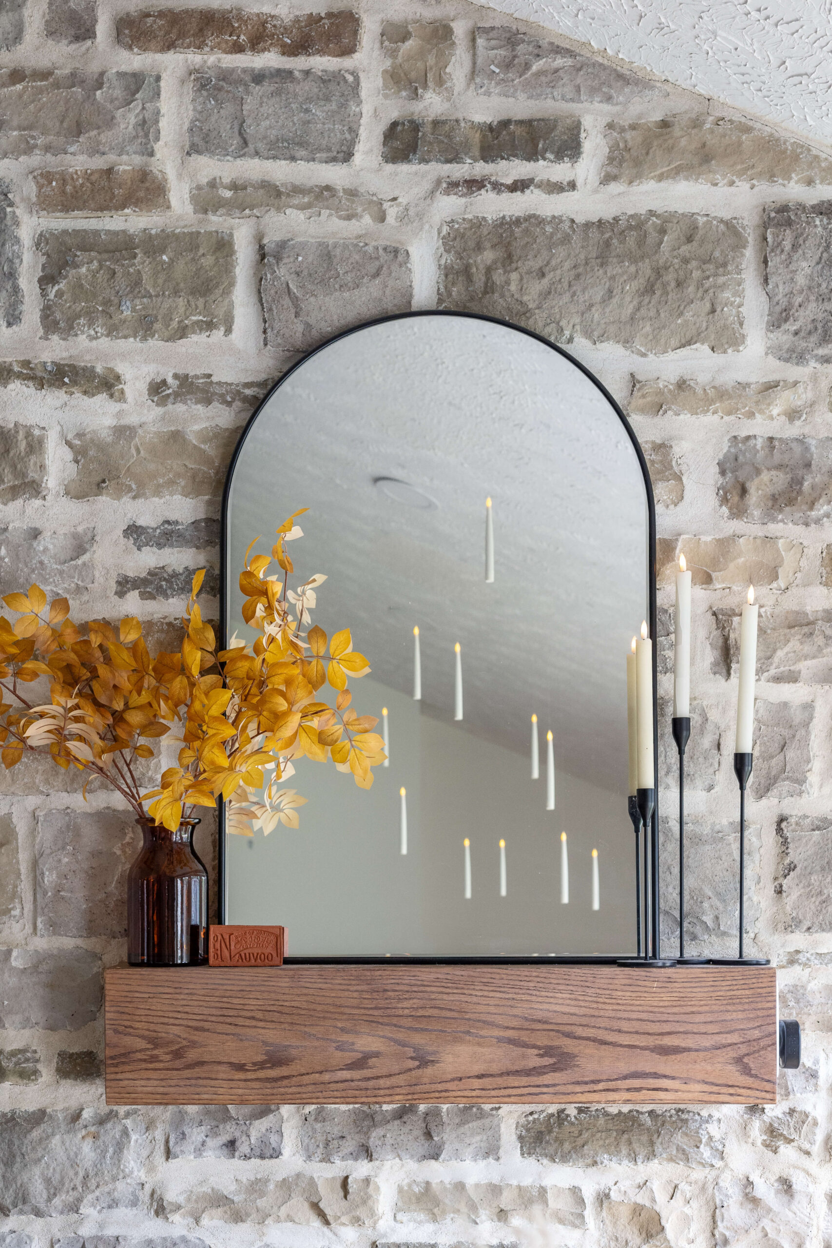 Floating candles over a kitchen table for Halloween decor.