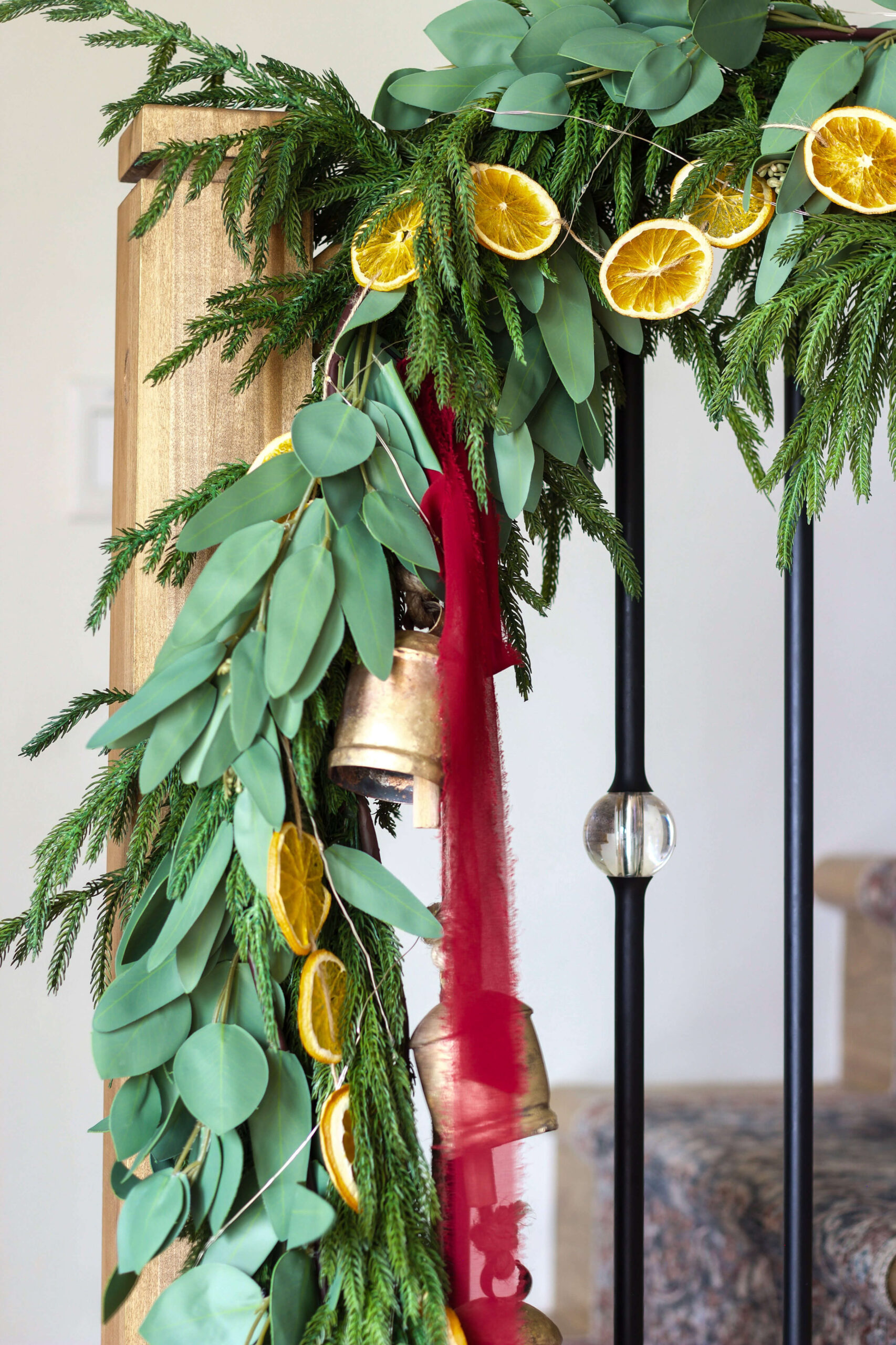 Layers of gorgeous Christmas garland on a decorated staircase.