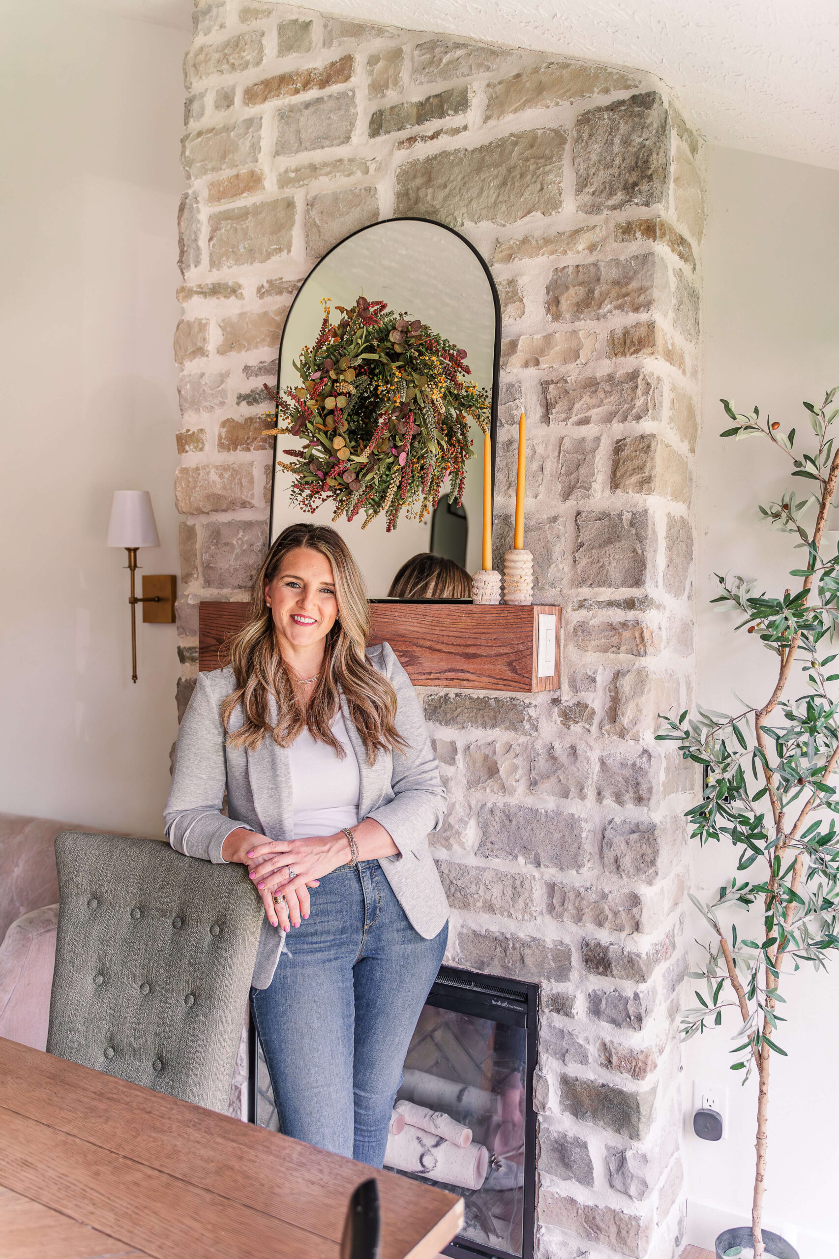 Gorgeous, DIY stone fireplace surround with electric fireplace insert.