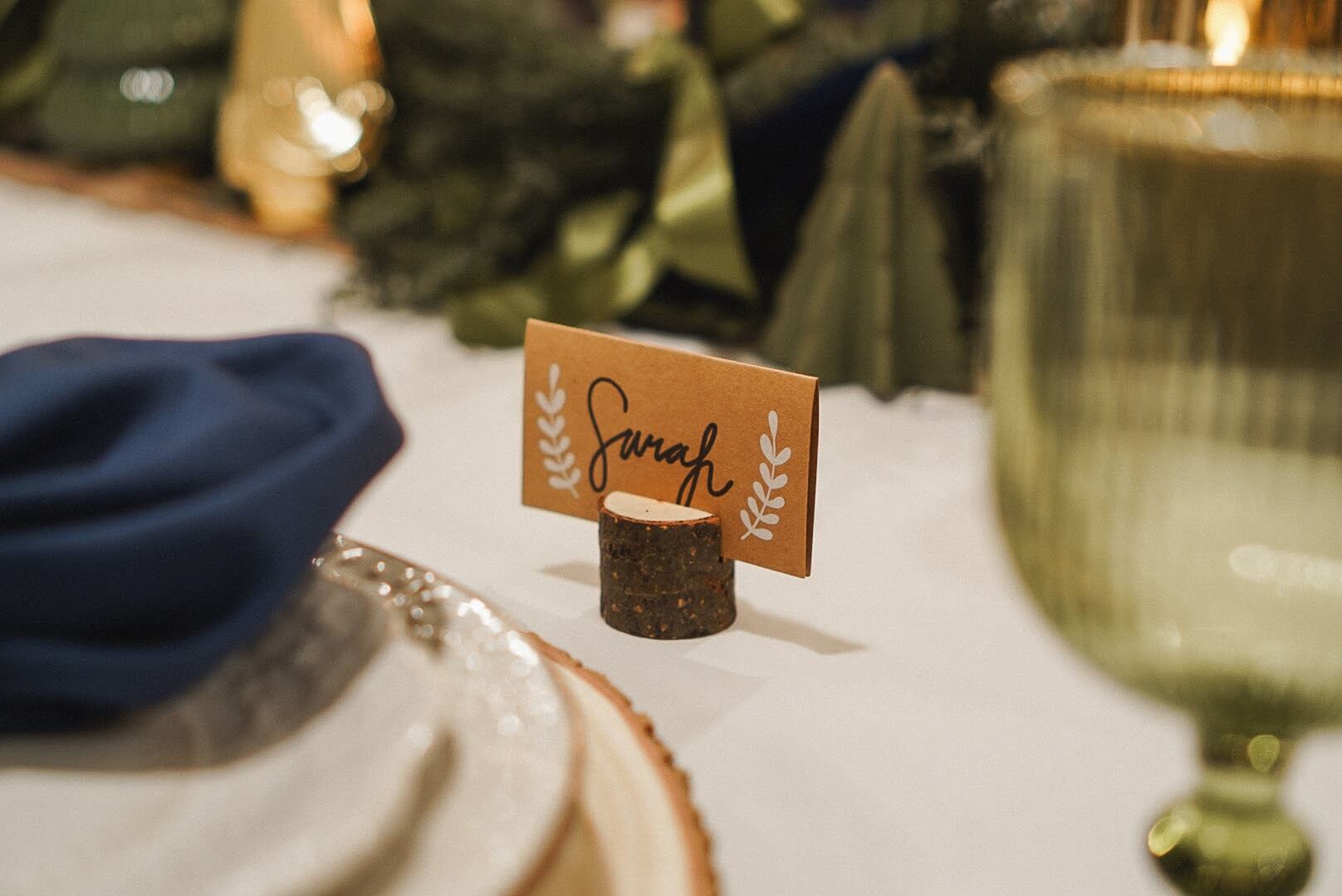 Rustic place card holder with handwritten name for Christmas dinner