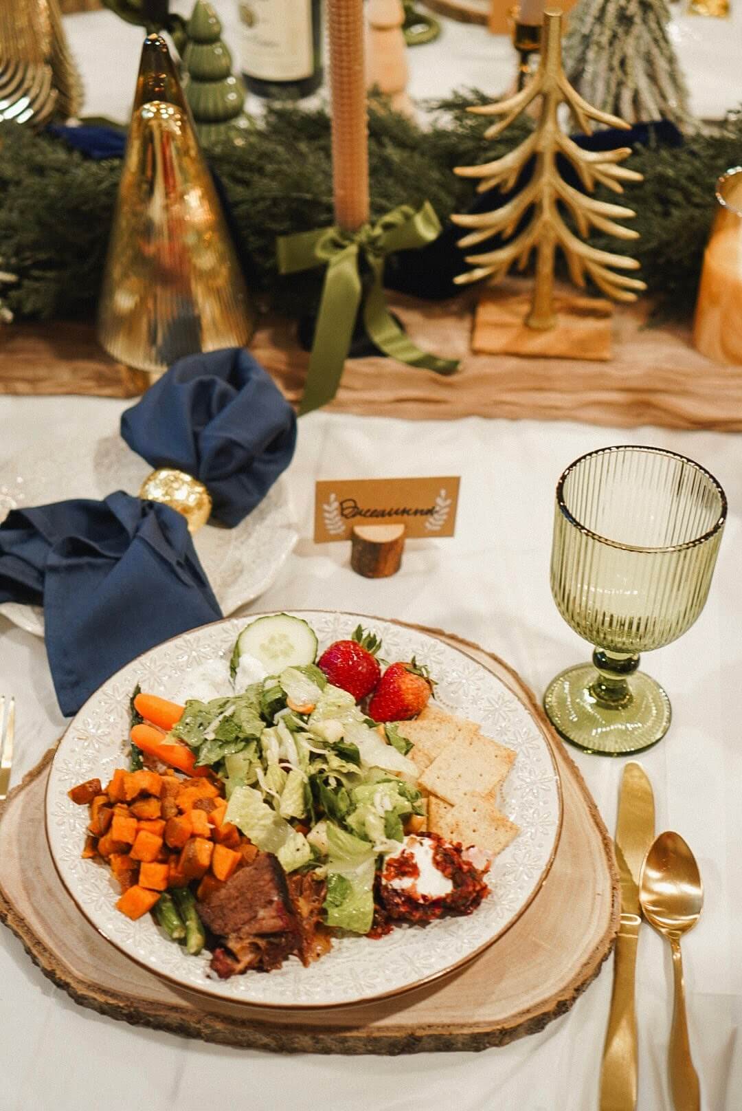 Festive Christmas dinner plate with salad and sweet potatoes