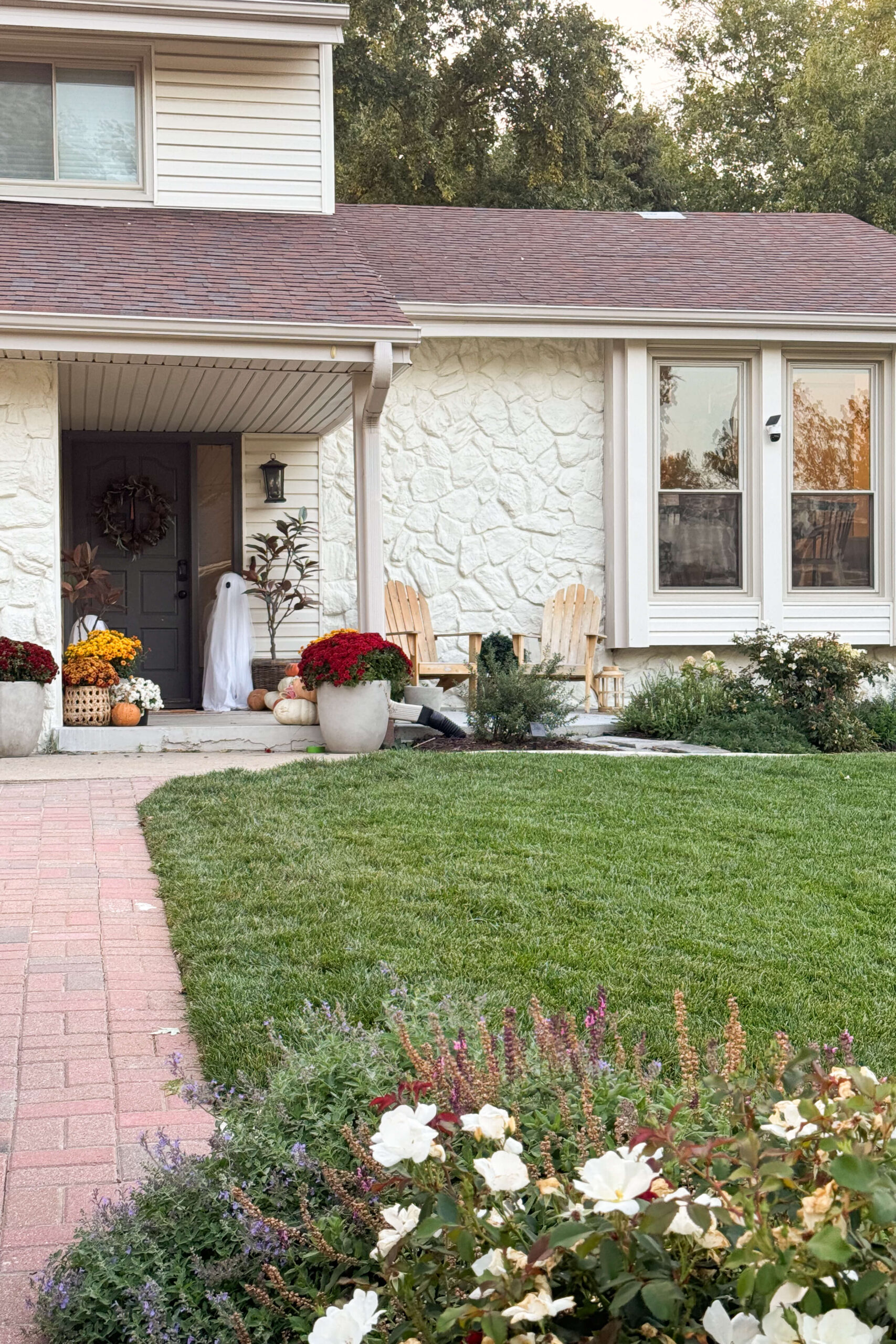 Gorgeous home exterior after a dated, rock siding makeover.